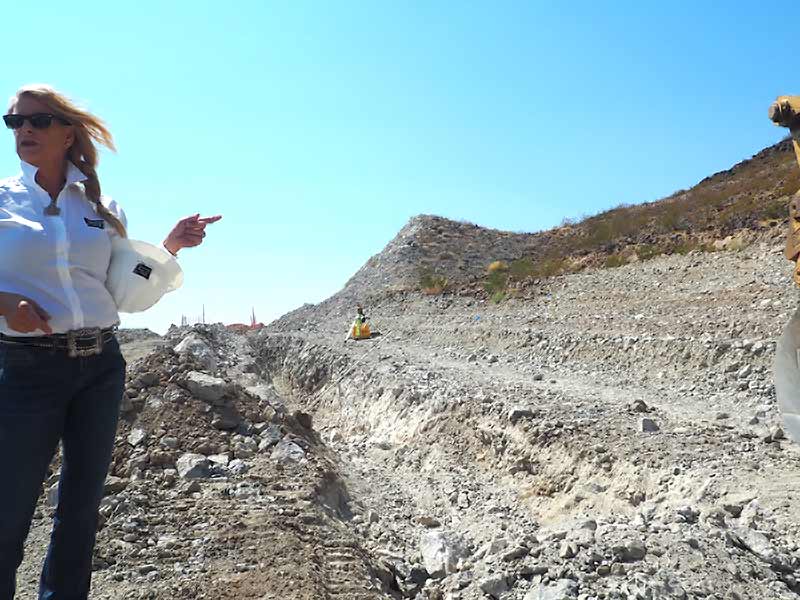 A C and S supervisor pointing out work across the site